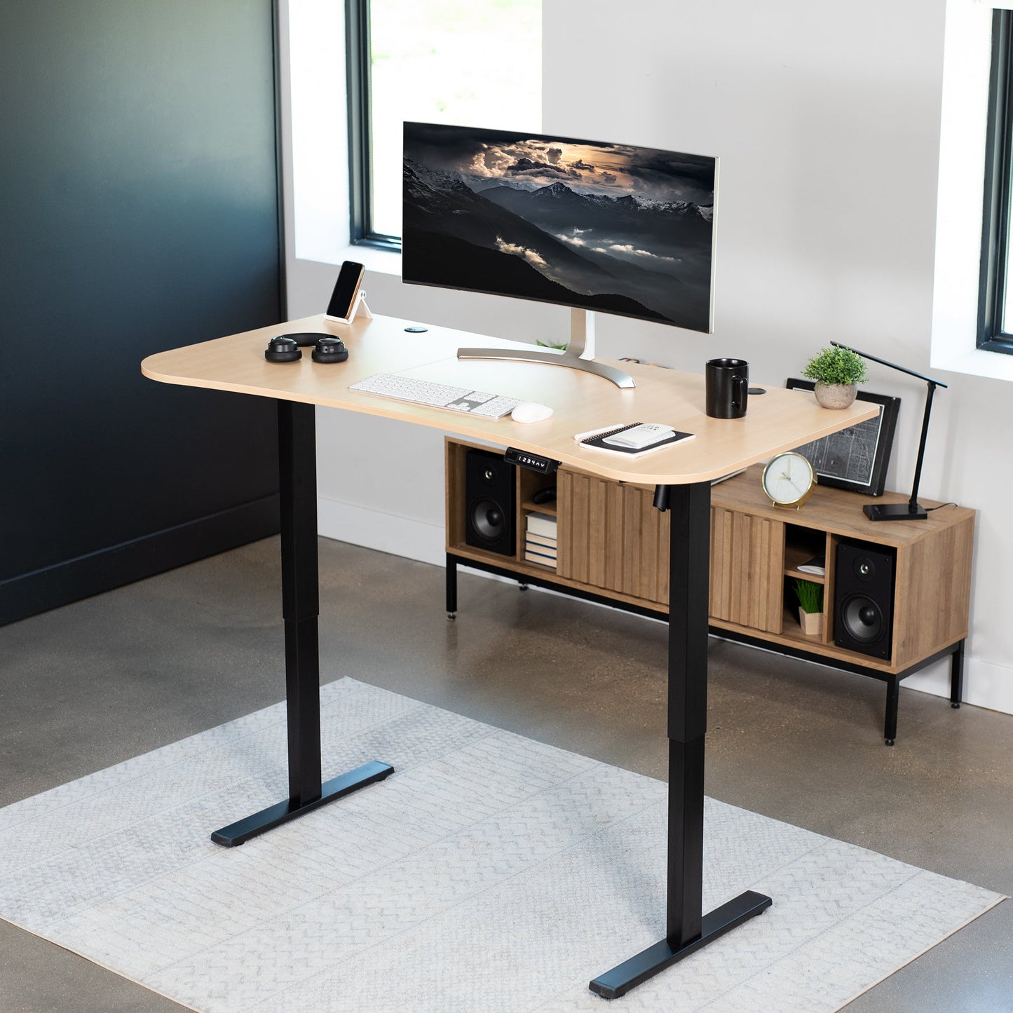 Spacious 63" x 32" Electric Height Adjustable Desk with Convenient Push Button Memory Control