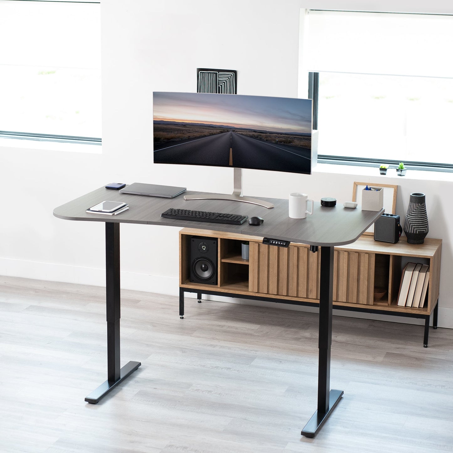 Spacious 63" x 32" Electric Height Adjustable Desk with Convenient Push Button Memory Control