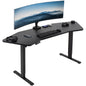 Spacious 71" x 24" Wing-Shaped Electric Standing Desk with Convenient Push Button Memory Control