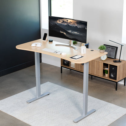 Spacious 63" x 32" Electric Height Adjustable Desk with Convenient Push Button Memory Control