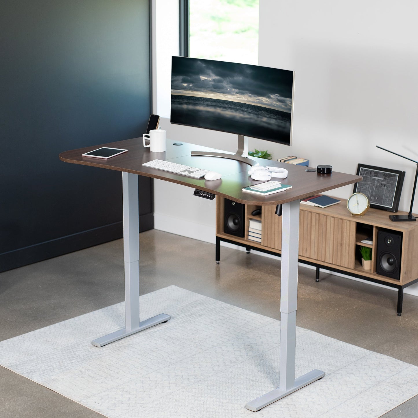 Spacious 63" x 32" Electric Height Adjustable Desk with Convenient Push Button Memory Control