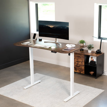 Spacious 63" x 32" Electric Height Adjustable Desk with Convenient Push Button Memory Control