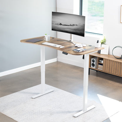 Spacious 63" x 32" Electric Height Adjustable Desk with Convenient Push Button Memory Control